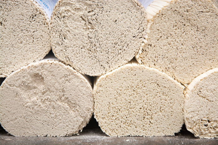 Stacks of drying rice noodles
