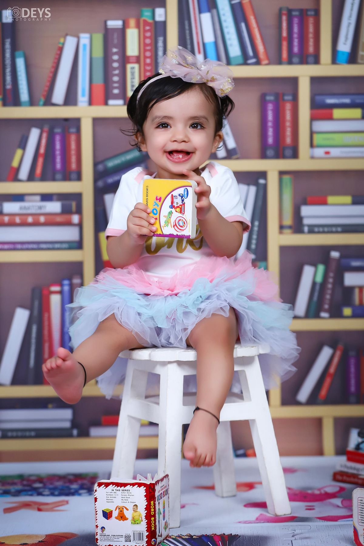 Photoshoot 1st birthday indoor in Delhi library theme