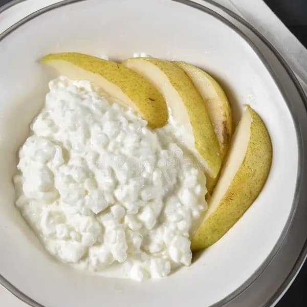 bowl of cottage cheese and sliced pears