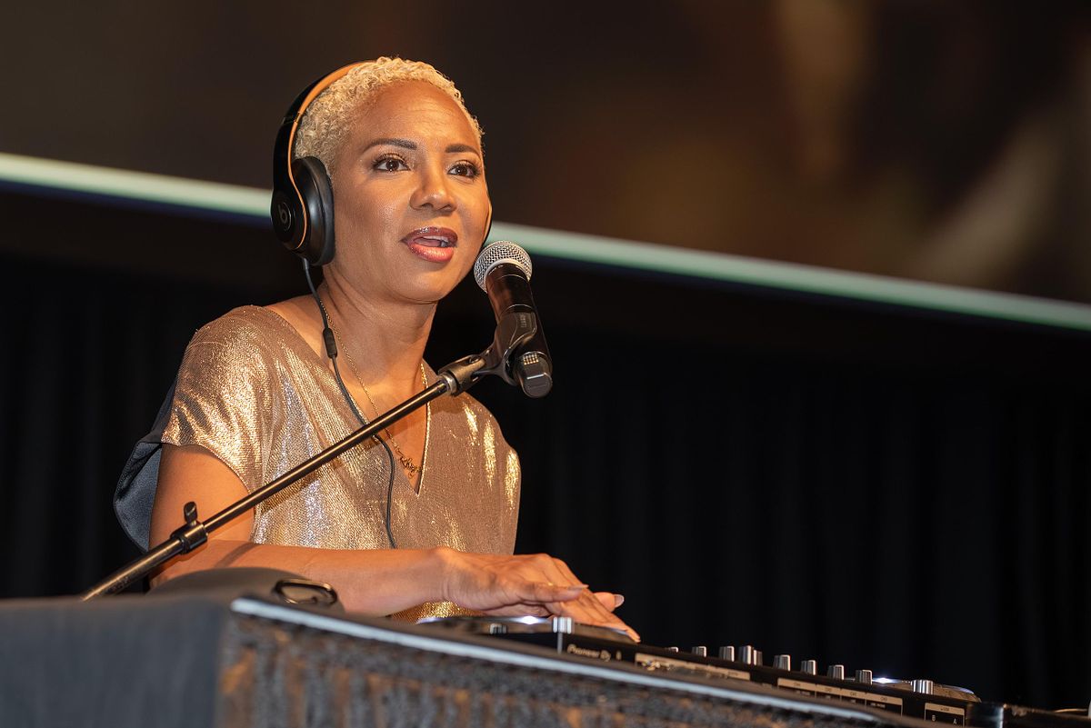 Event photography capturing legendary artist MC Lyte performing as DJ during AFSCME’s 45th International Convention in Philadelphia, blending artistry, energy, and leadership through music.