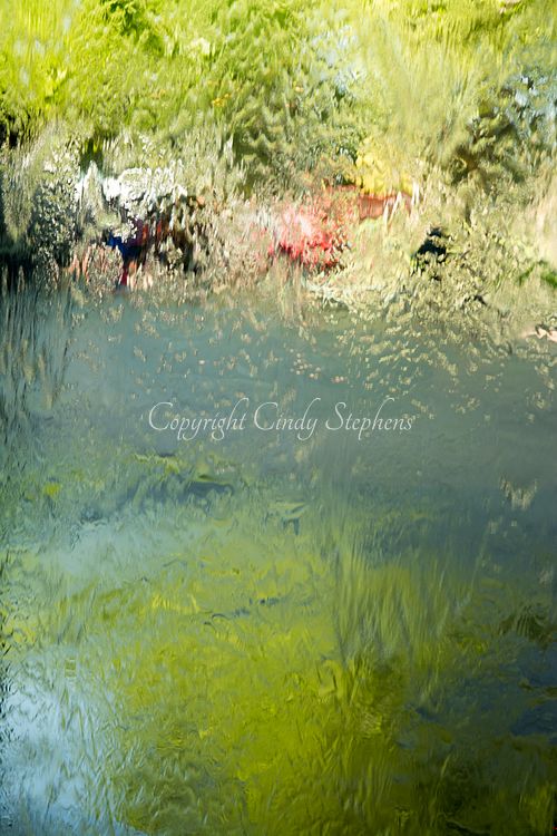 Vibrant abstract photograph inspired by watercolor impressionism, featuring a dynamic blend of greens and blues that adds tranquility and color to modern home decor