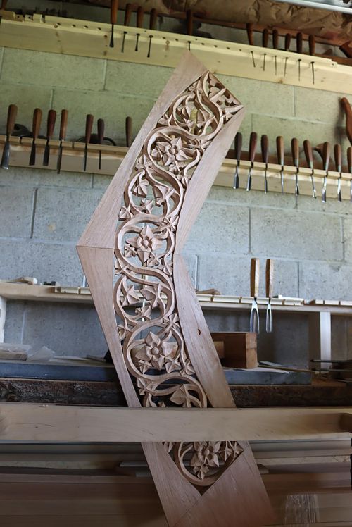 two panels carved and glued before the outlines of the arch are cut out