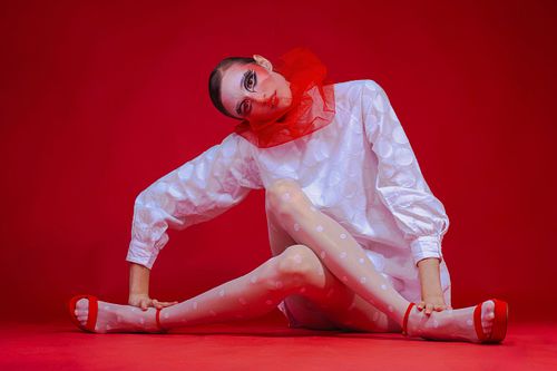 Model wearing contemporary fashion, editorial styling, shot in studio by Jamila Filippone.