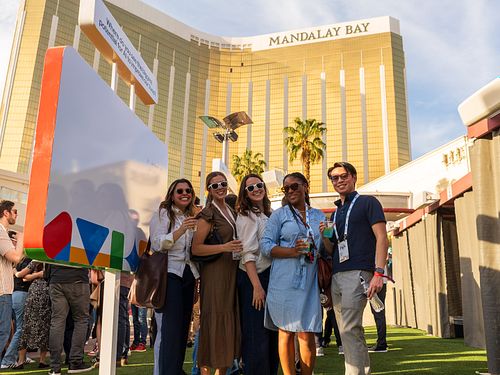 Wide shot of the after party crowd at the Imagine AI Live Conference — event photography by David Andrade, Las Vegas