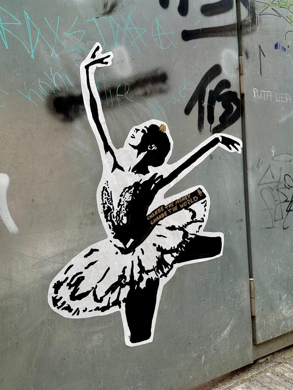 Street art stencil of a ballerina gracefully dancing, with her tutu featuring the text "CHANGE THE MONEY CHANGE THE WORLD" and a small Bitcoin symbol (₿) near her head. This elegant piece by Street Cyber symbolizes the transformative power of Bitcoin and decentralization, suggesting that subtle shifts in financial systems can lead to profound global change. It blends beauty and activism.