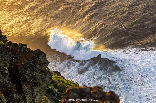 Crushing wave during sunset