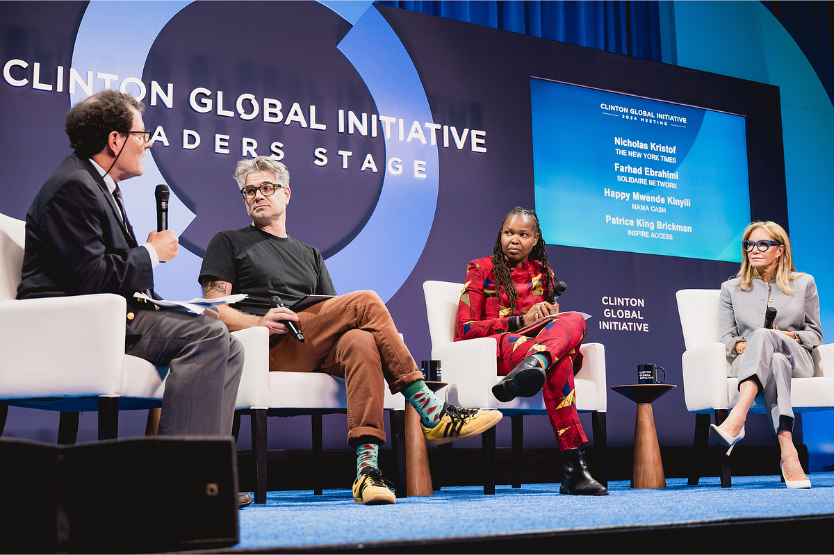 Leadership panel discussion at the Clinton Global Initiative 2024 meeting in New York City, capturing executive presence, strategic dialogue, and audience engagement during a global conference.