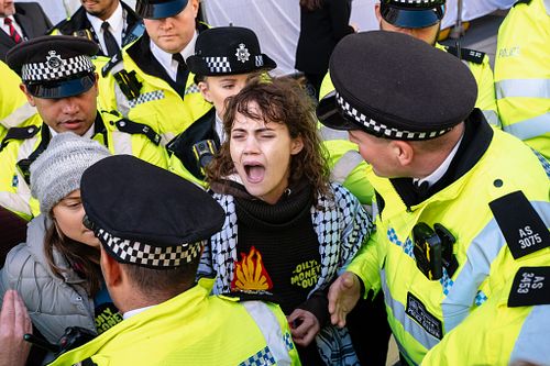 Climate activists including Fossil Free London disrupt the Energy Intelligence Forum, London, UK