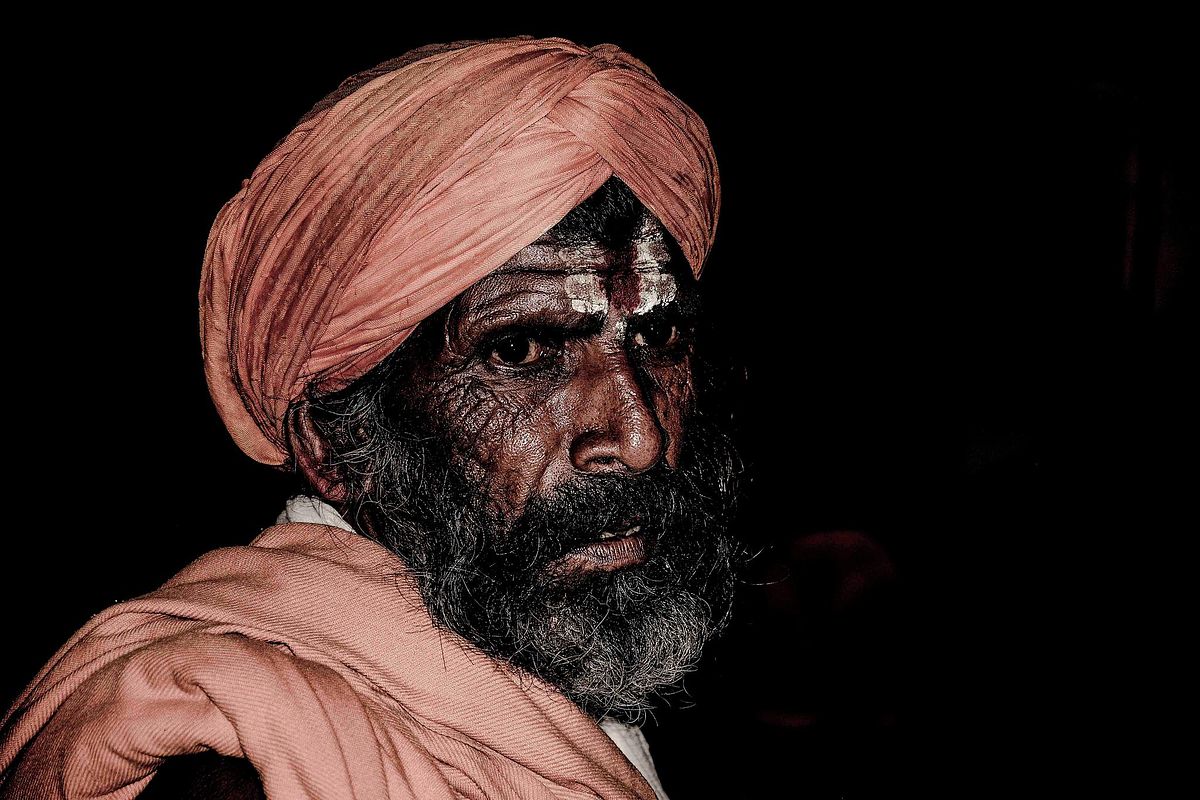 portrait, beard man, Oldman, waiting, low light shoot, safarron clothes, sadhu