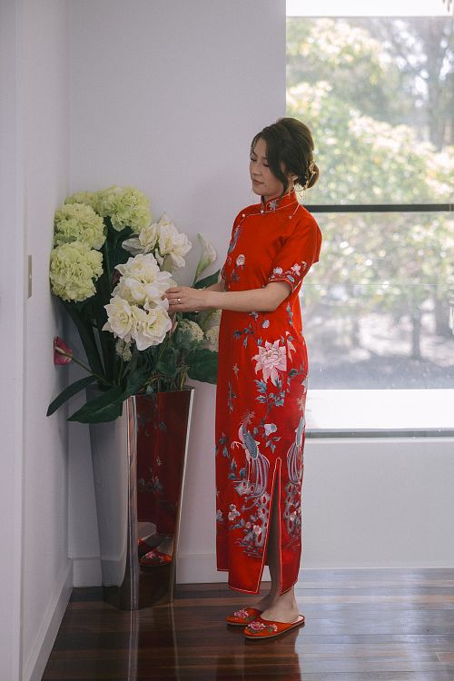 Chinese bride getting ready for traditional tea ceremony