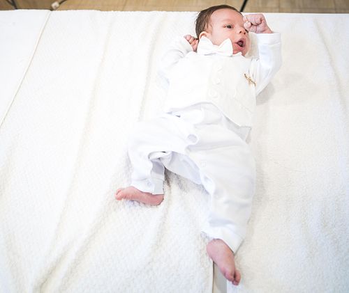 baby baptism ceremony at Ottawa church captured by Kameel Photography