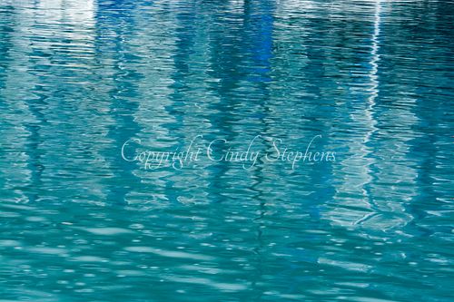 A range of blue hues reflected in water create a soothing scene