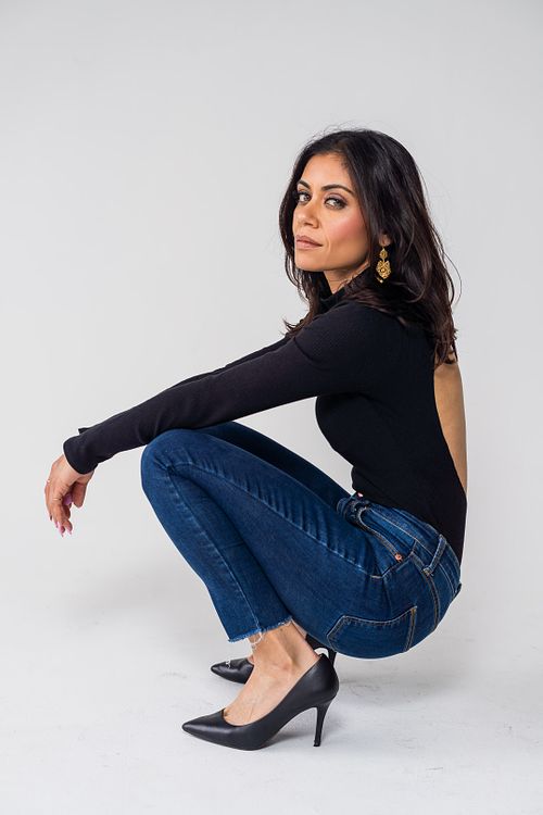 Half-body studio portrait of Umangi with softbox and strobe lighting — editorial portrait by David Andrade, Los Angeles