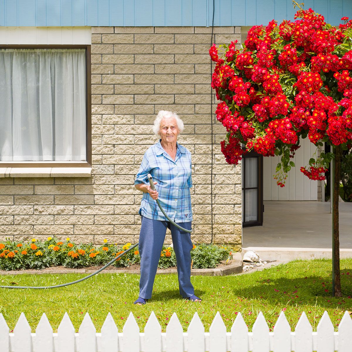 women with hose pipe