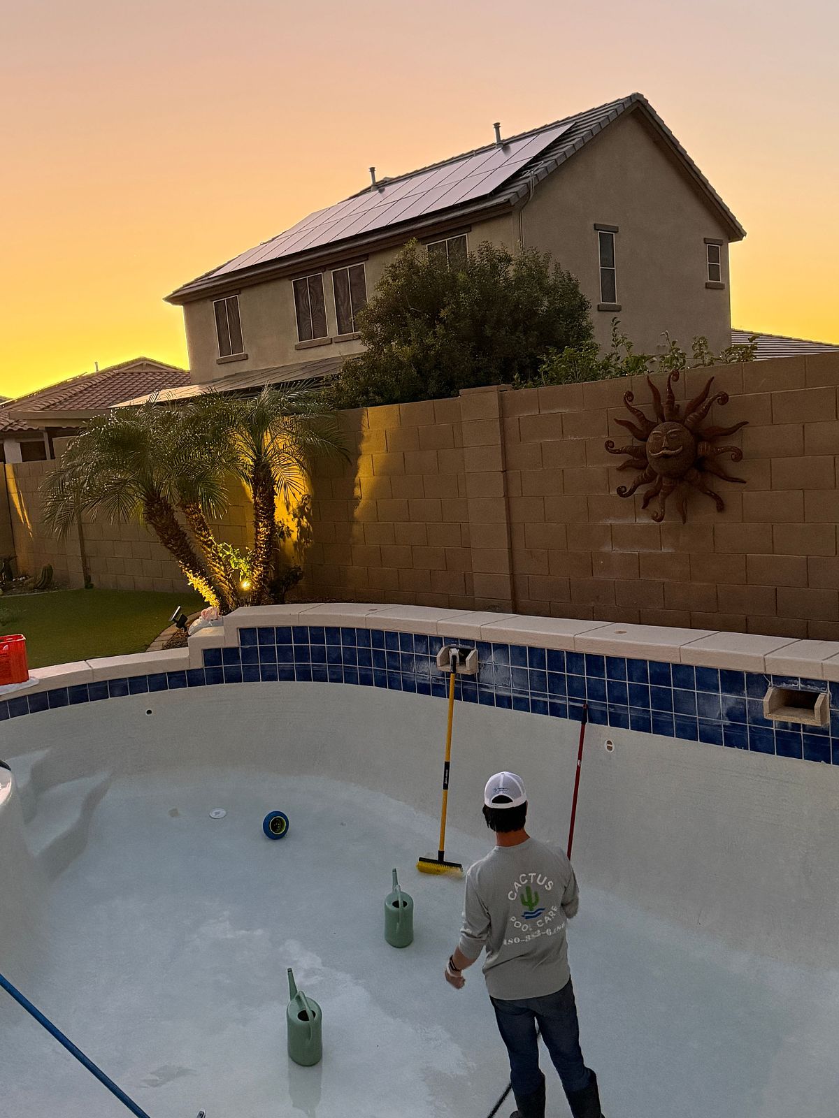 Cactus Pool Care servicing a pool with an acid wash