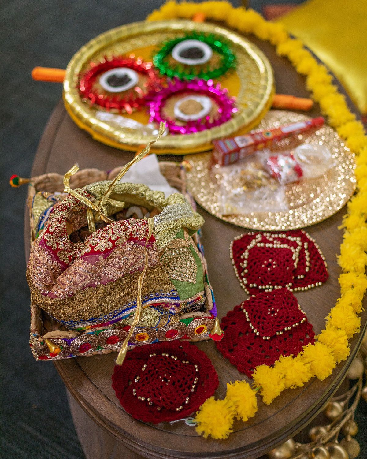 detailed shot of colourful gifts at a traditional mehndi wedding celebration