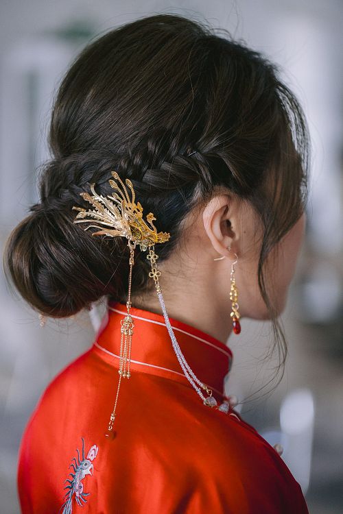 Chinese bride getting ready for traditional tea ceremony