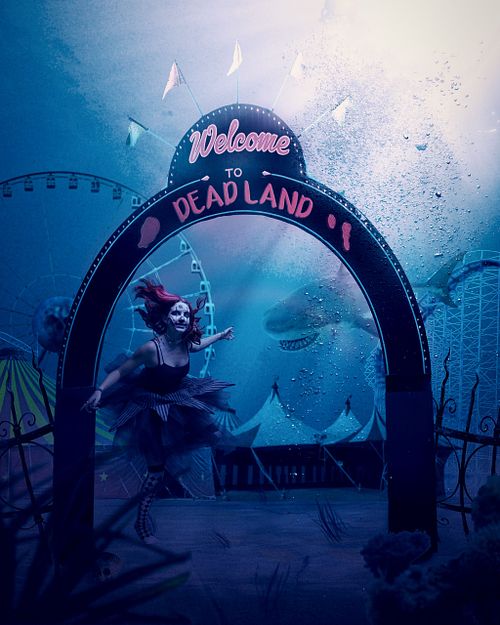 A zombie floating behind the gateway to an underwater amusement park.