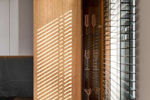 Play of light and glass highlighting textures and geometric forms in the interior &ndash; Herculane project