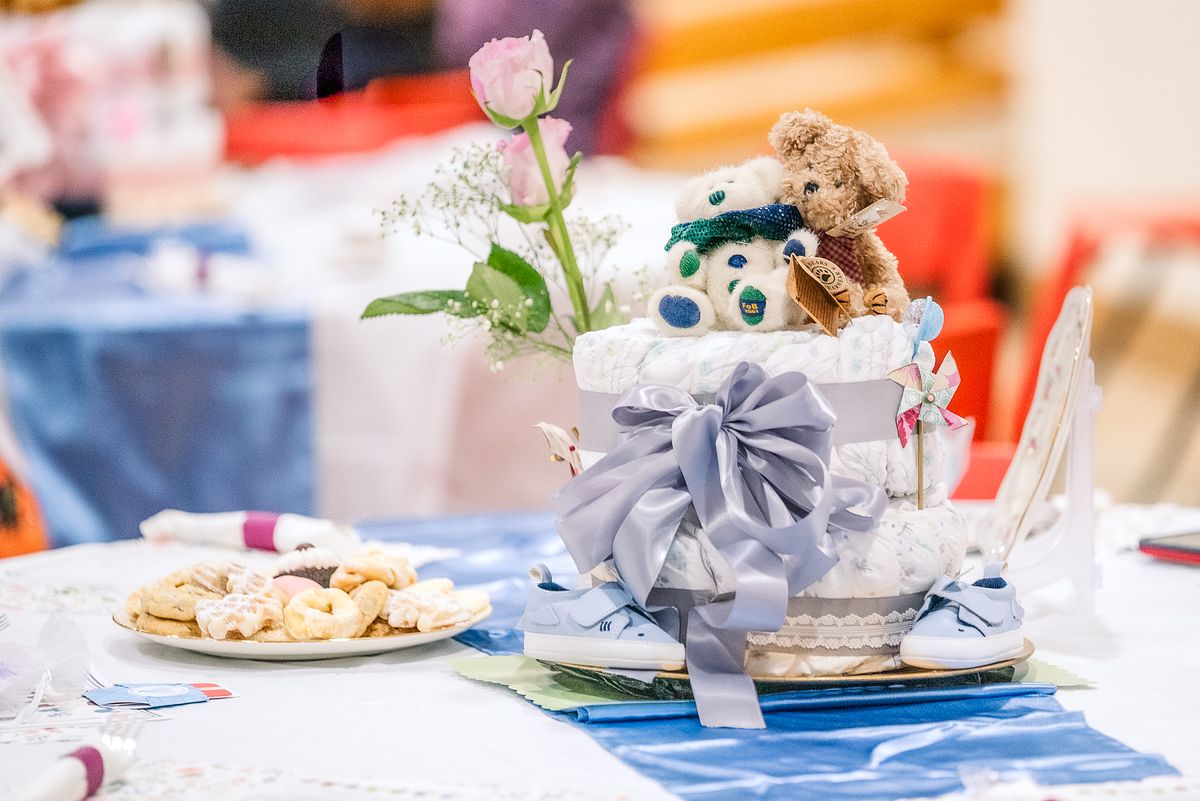 Diaper cake centerpiece at Divine Grace Community Baby Shower by Cranberry Township, PA newborn photographer