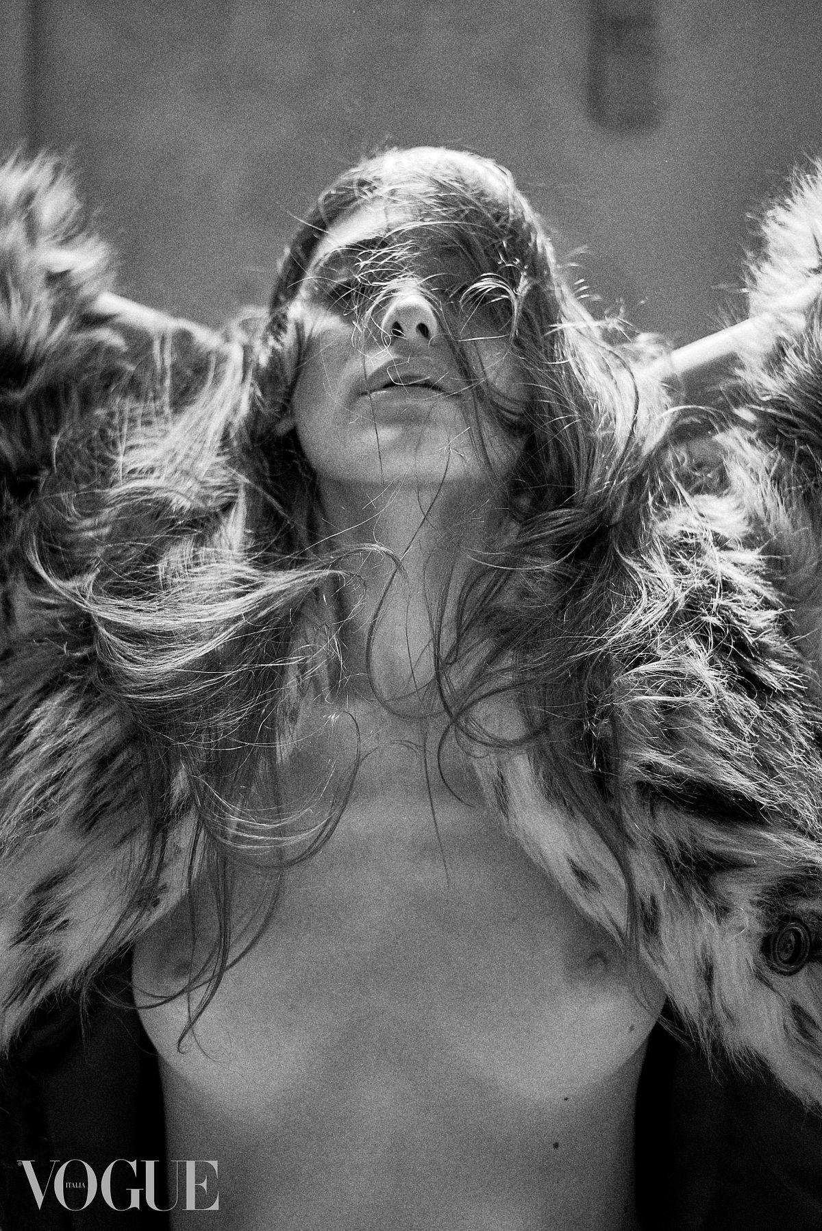 Selected for Photo Vogue Italia online portfolio. A fashion portrait of a female model wearing a fur coat, photographed by Gabriel Matula.