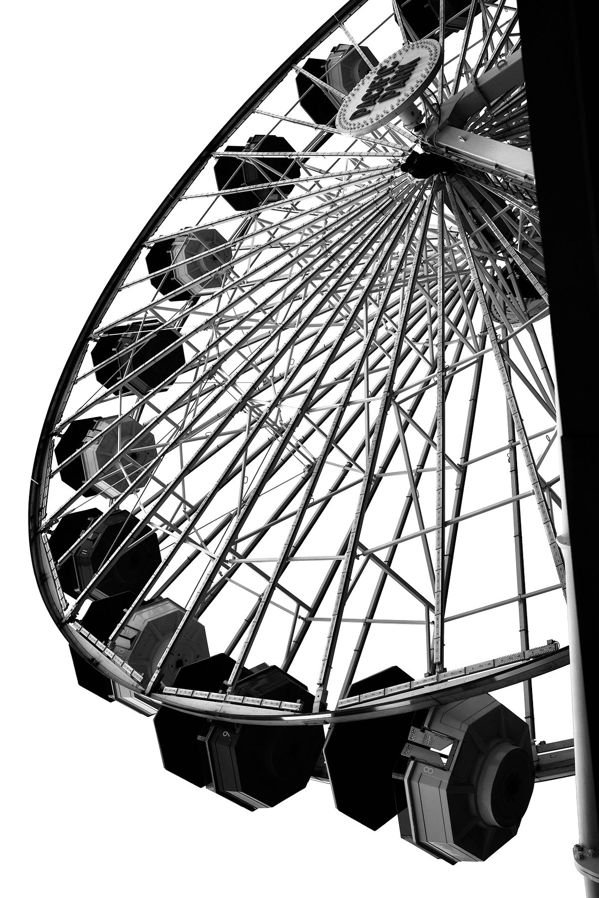 Black & white photo of a ferris wheel on Santa Monica Pier, CA