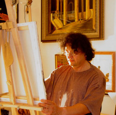 Patrice Goubeau dans son atelier, peignant devant son chevalet