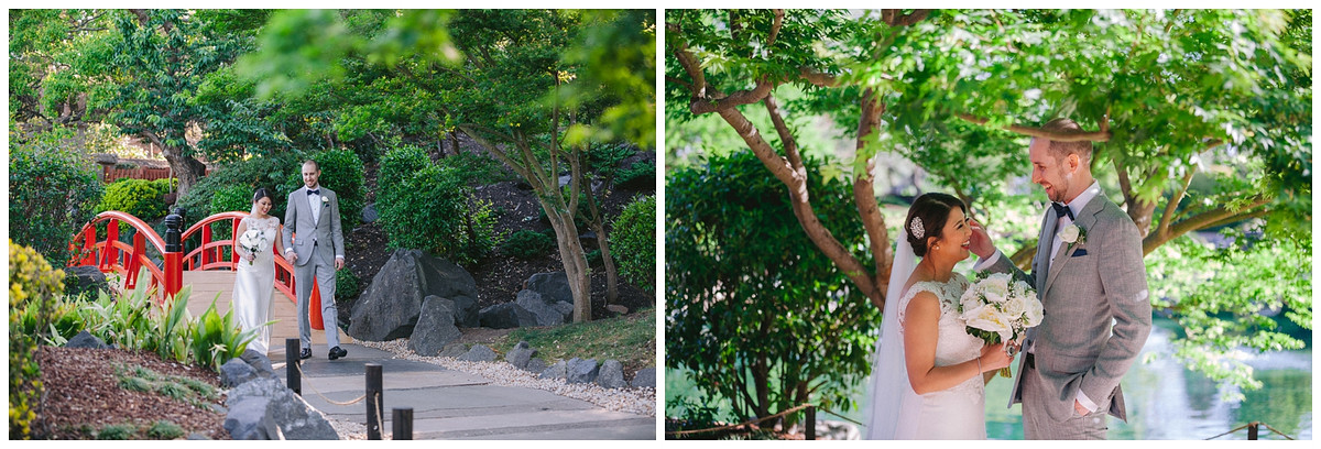 A candid wedding photo of the bride and groom crossing a bridge at Japanese Garden Auburn Botanic Gardens.