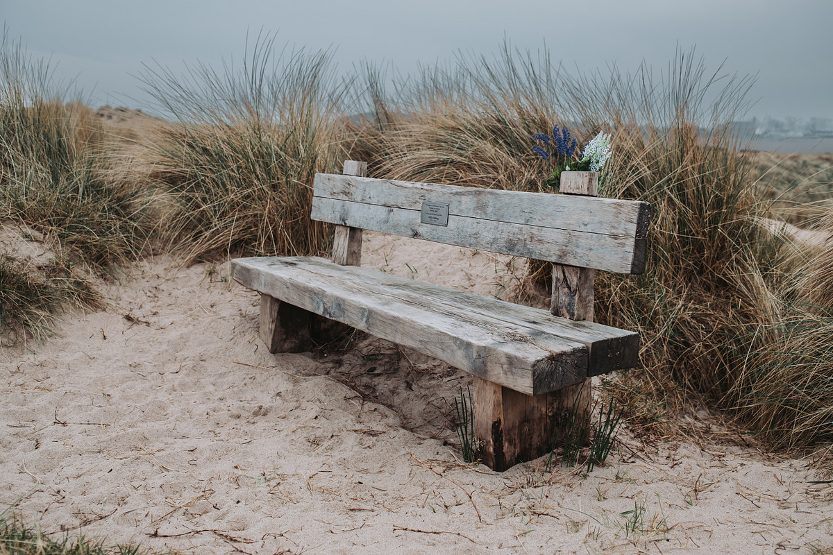 Wooden bench on beach