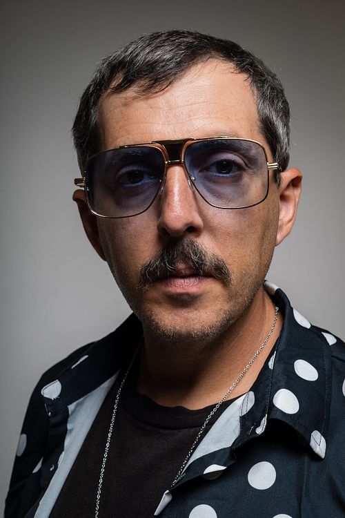 Three-quarter profile studio portrait of Ben Weiss with softbox lighting — editorial portrait photography Las Vegas