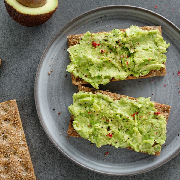 avocado toast on a rustic plate