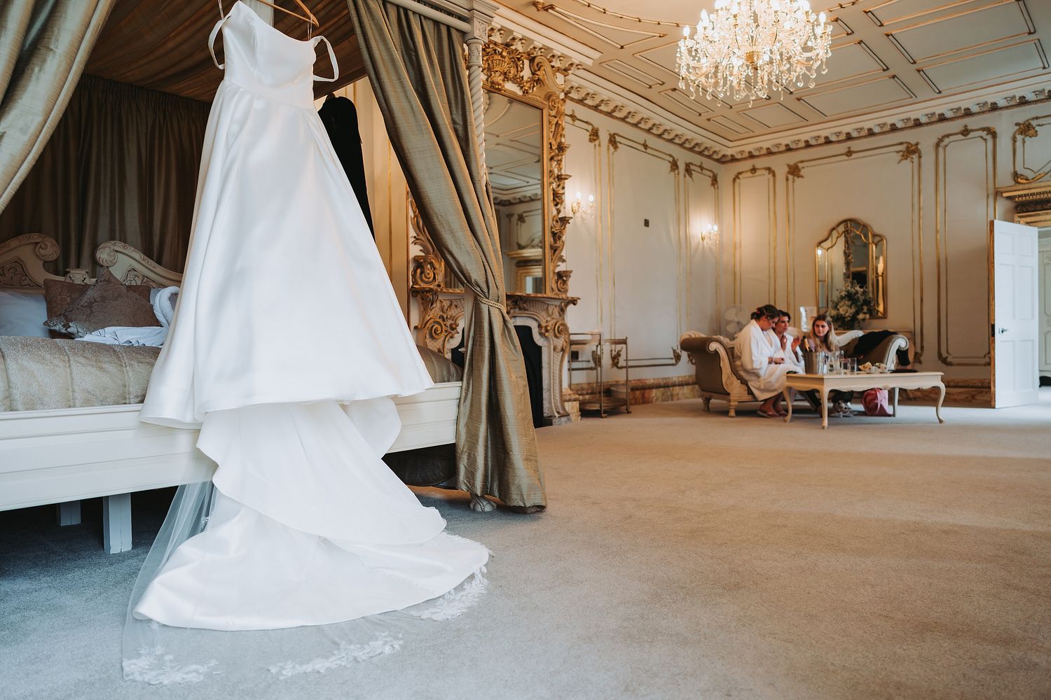 Brides dress in getting ready room