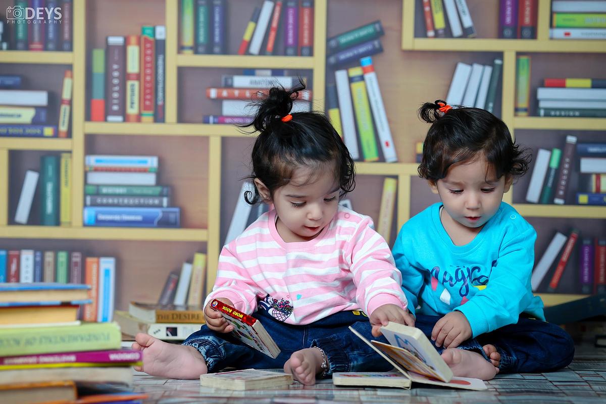 Pre birthday photoshoot baby twin girls in Gurugram