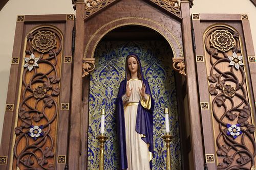 total statue restoration of the Blessed Virgin Mary and a custom, hand-carved shrine with vines and flowers