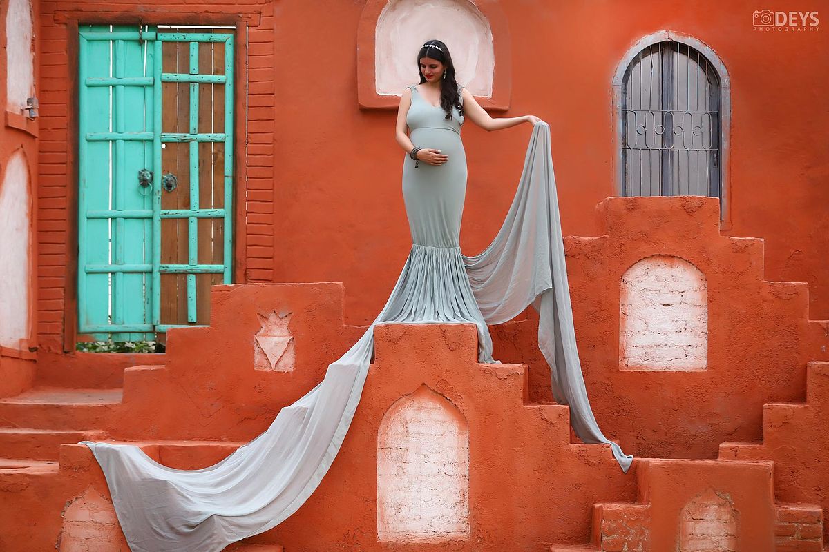 Mint green mermaid gown pregnant mother theme studio photoshoot