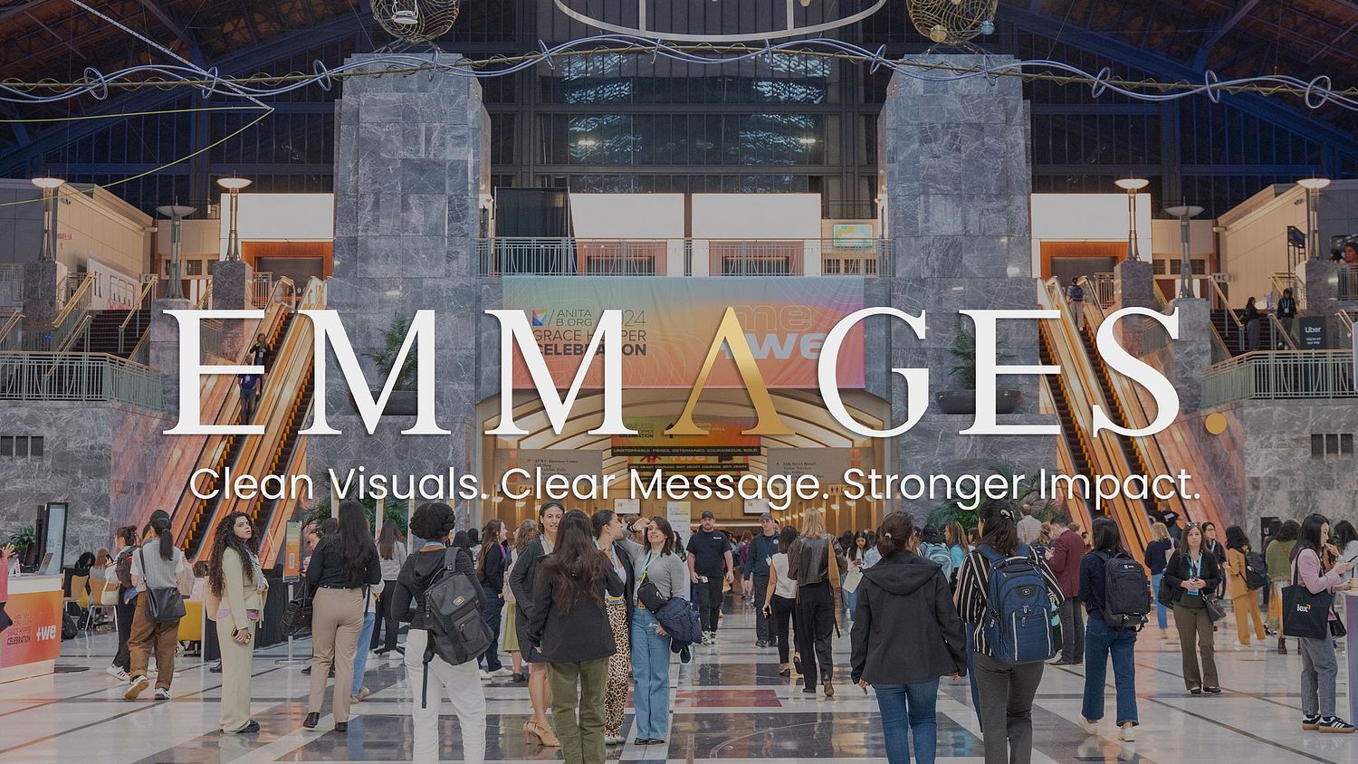 Conference attendees gathering inside a large convention center during a major technology conference