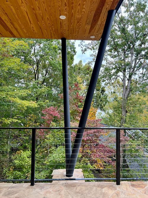 Angled 'V' Posts made of steel holding up steel deck