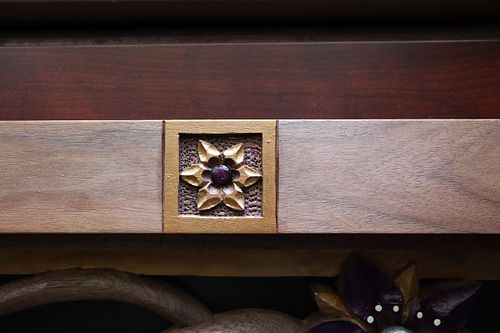 Small carving of Star of Bethlehem flower in the door frame of St. Joseph Shrine for St. Bernadette Catholic Church in Lancaster, Ohio