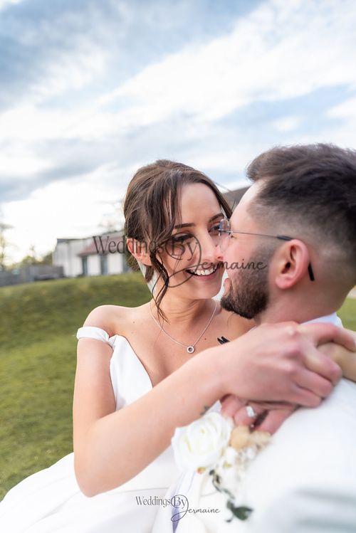 Wedding by Jermaine – bride and groom embrace during an emotional wedding moment at Sketchley Grange Hotel